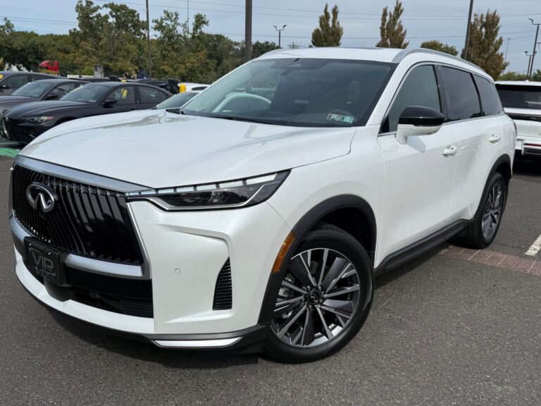 White 2027 INFINITI QX60 Luxe with the bamboo-inspired grille and piano-key daytime running lights